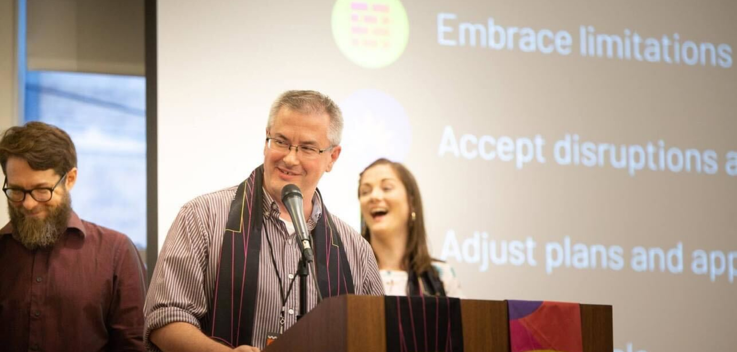 Trevor Minton and Annie Hensley on stage at Openfield's Box of Crazy design thinking event.